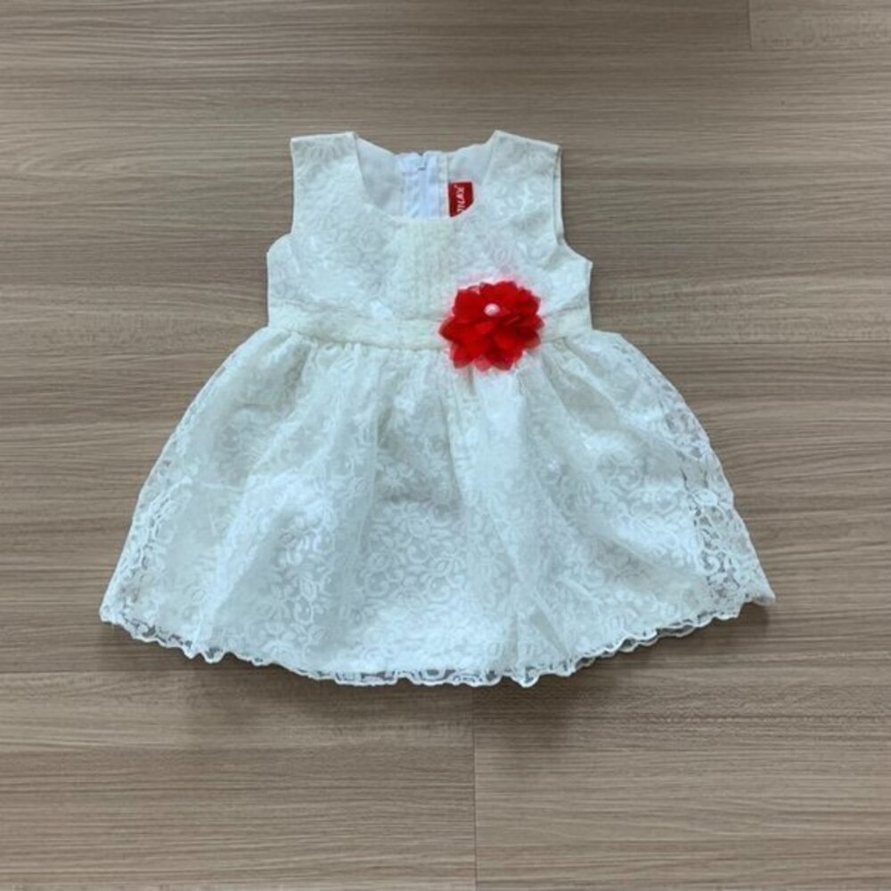 New white lace dress in size 6 months